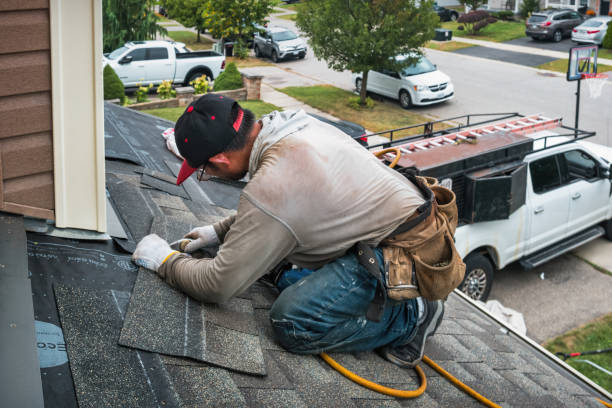Professional Roof Leak Repair technician working in Warfield, VA